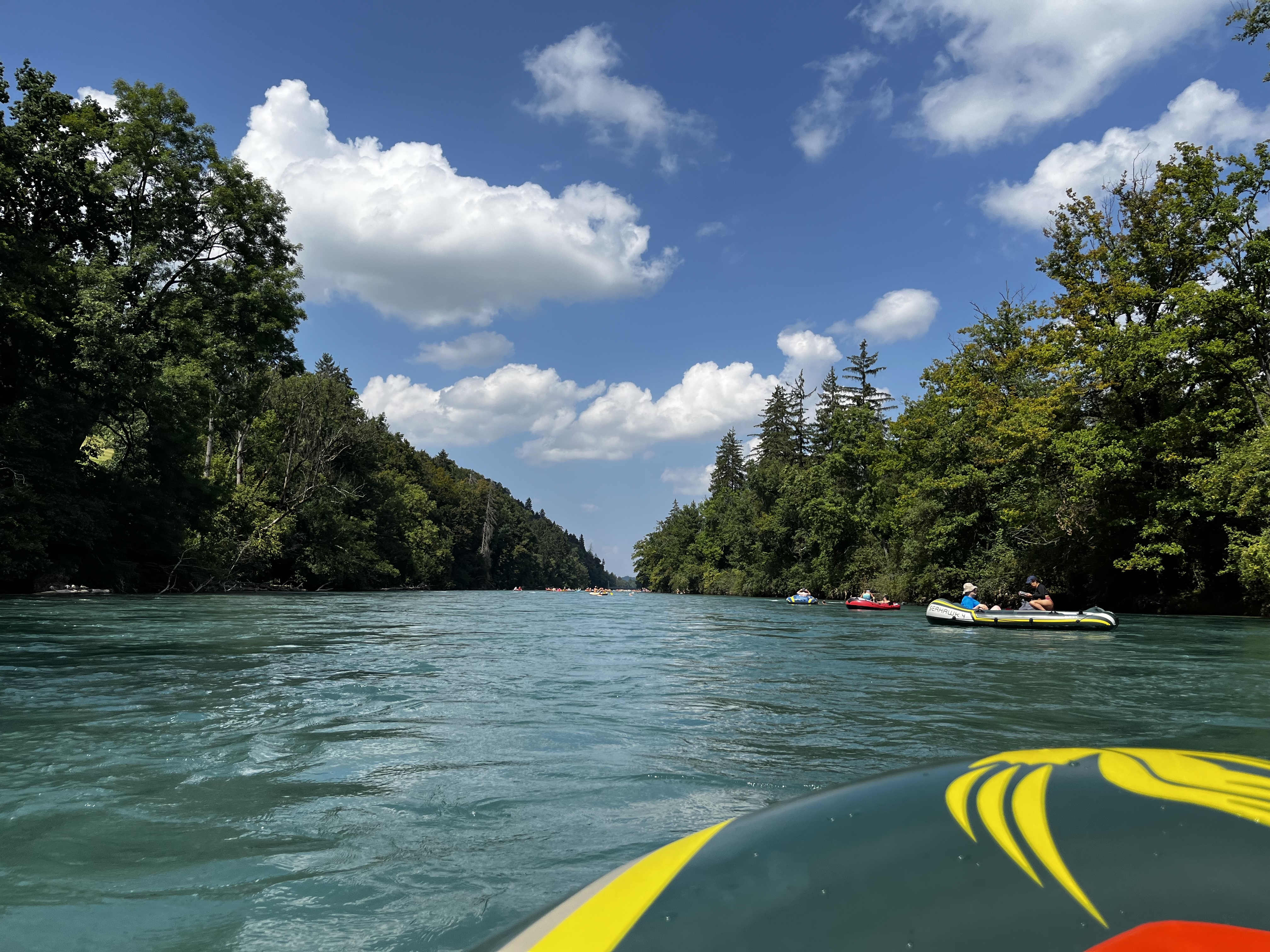 Canoeing on a peaceful lake with scenic mountain views