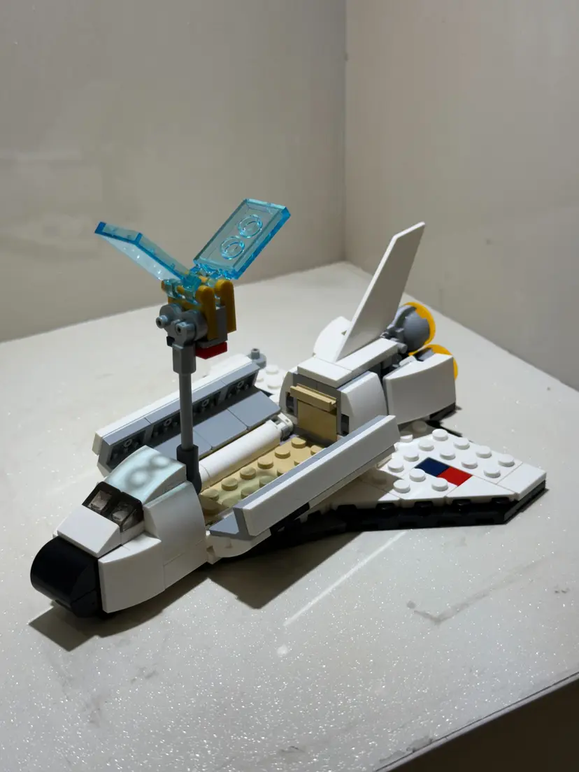 White Lego space shuttle model with open cargo bay